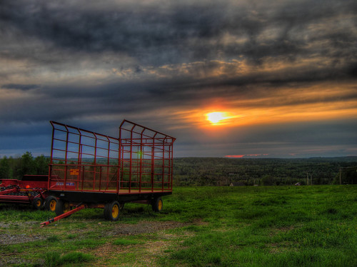 sunset knox maine rural farmequipment red grass stormy cloudy day