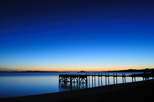 ocean blue newzealand sky orange beach water auckland wharf bluehour maraetai aotearoa beforesunrise