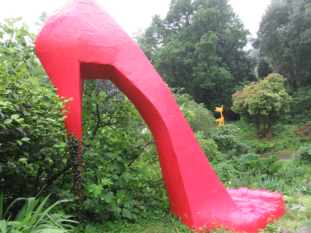 UK - Devon - Near Muddiford - Broomhill Sculpture Garden - Red Stiletto by Greta Berlin