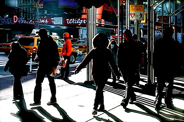 new york city times square people shadows