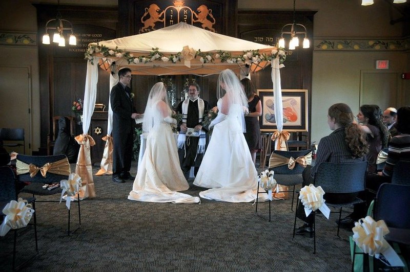 My wife and me under the DIY chuppah at 