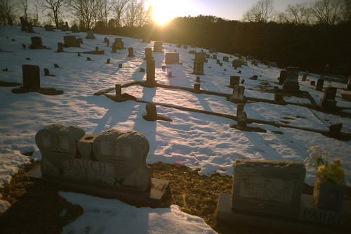 sunset friedhof snow cemetery headstones graves gravestones