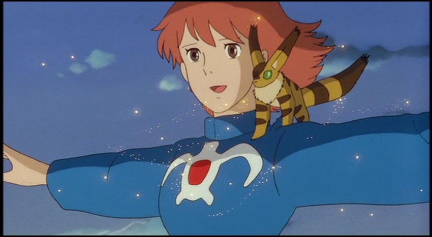 Nausicaa standing with her arms out.
