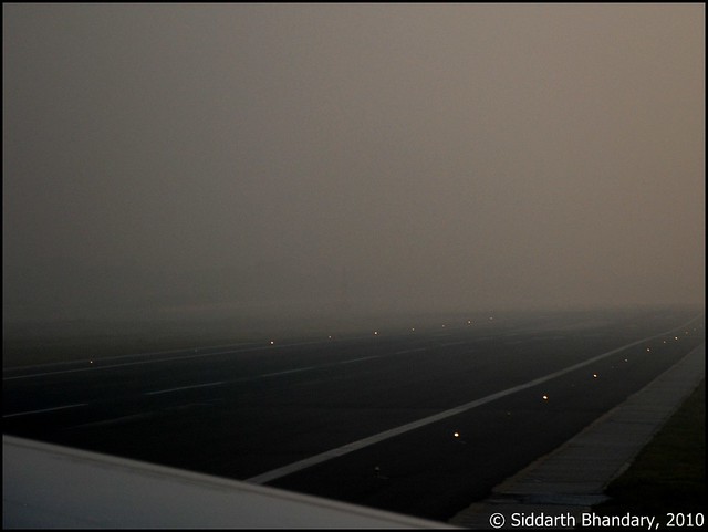 Exiting a foggy runway at Chennai
