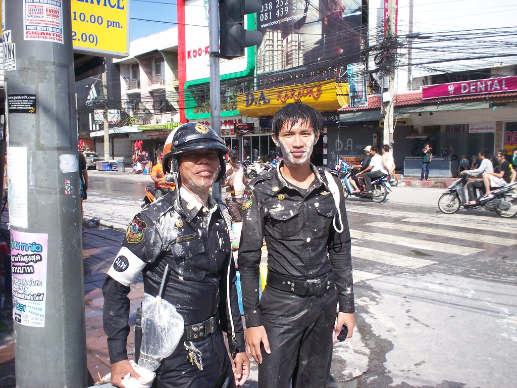 Thai Police soaked and floured