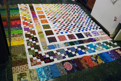 There. Done. To say I am delighted is an understatement. I am glad I took the extra time to sort the fabrics, to get a rough divide between warm and cool colors. The result isn't obvious, but it's subtly harmonious.

Also?  I just LIKE it. So there. Neener.  I'm keeping this one.

Approximate size: 80'x88'

Accompanying blog entry: domesticat.net/2010/03/these-are-few-my-favorite-things