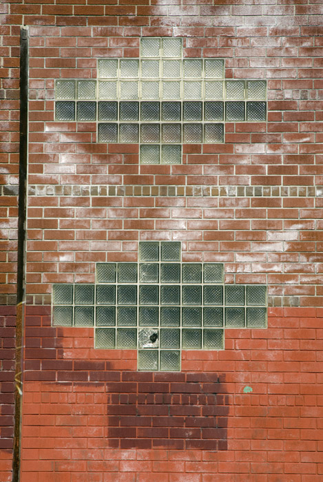 Art Deco Glass Bricks on a brick wall in Gowanus, Brooklyn, New York