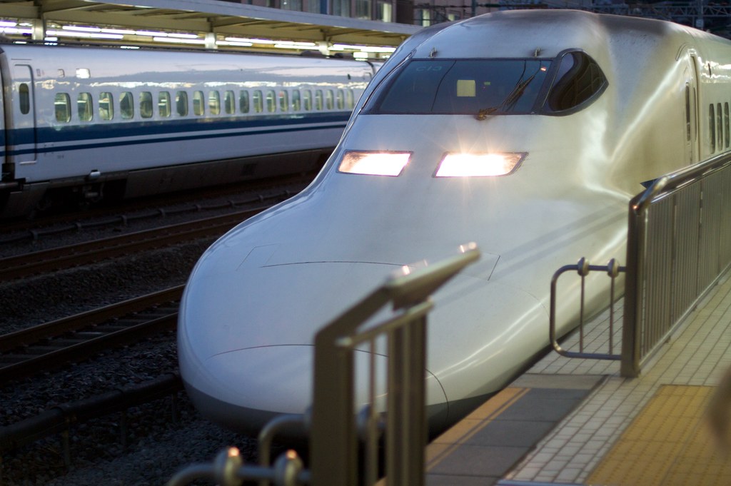 Shinkansen bullet train at a Japanese station, representing daily life shaped by the new Japan visa renewal fees