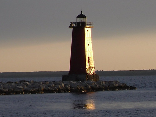 sunset lighthouses peaceful manistique