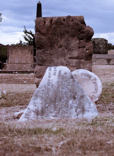 broken graveyard headstone cemetary overcast marble