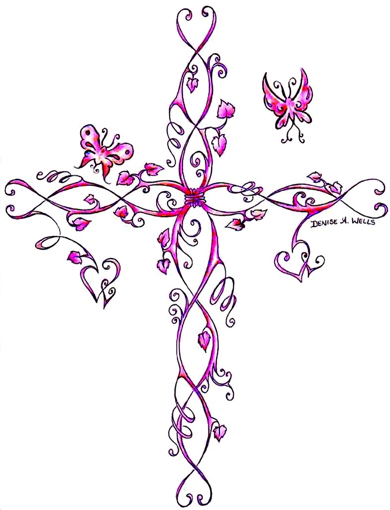 A Cross made from vines, leaves, hearts and butterflies