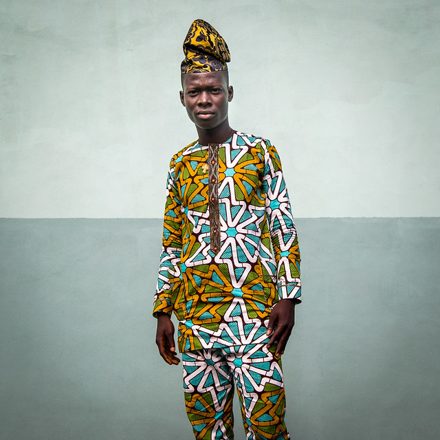 Benin, West Africa, Ganvié, fashionable young man in traditional beninese clothing