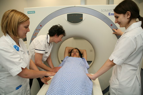 Students working with CT scanner