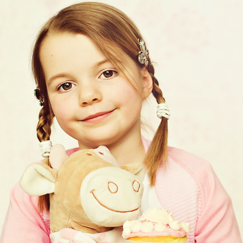 Julie, a pink cupcake and her favorite cow... | by Kids in the Picture
