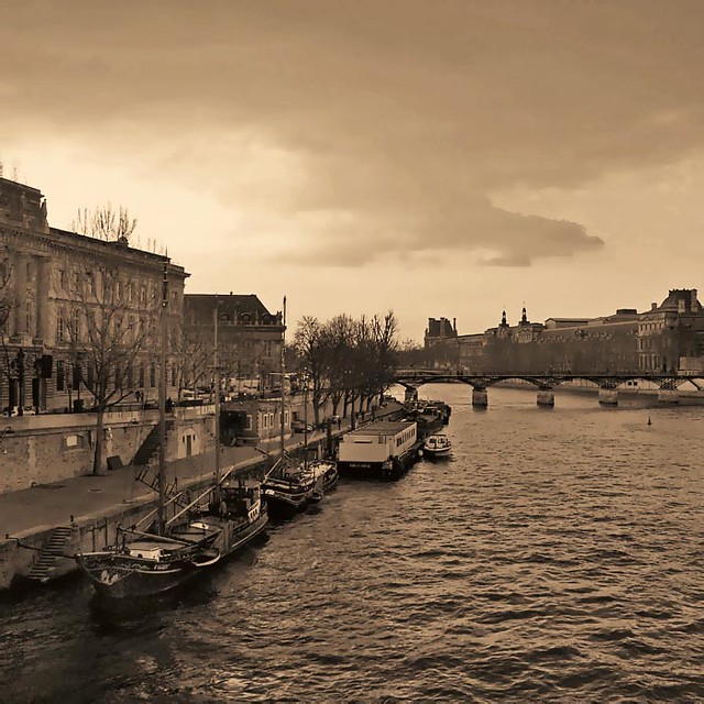 Rita Crane Photography: France / Paris / quais / river / vintage / sepia / la seine / boats / louvre / pont des arts / Nostalgic View along the Quais, Paris