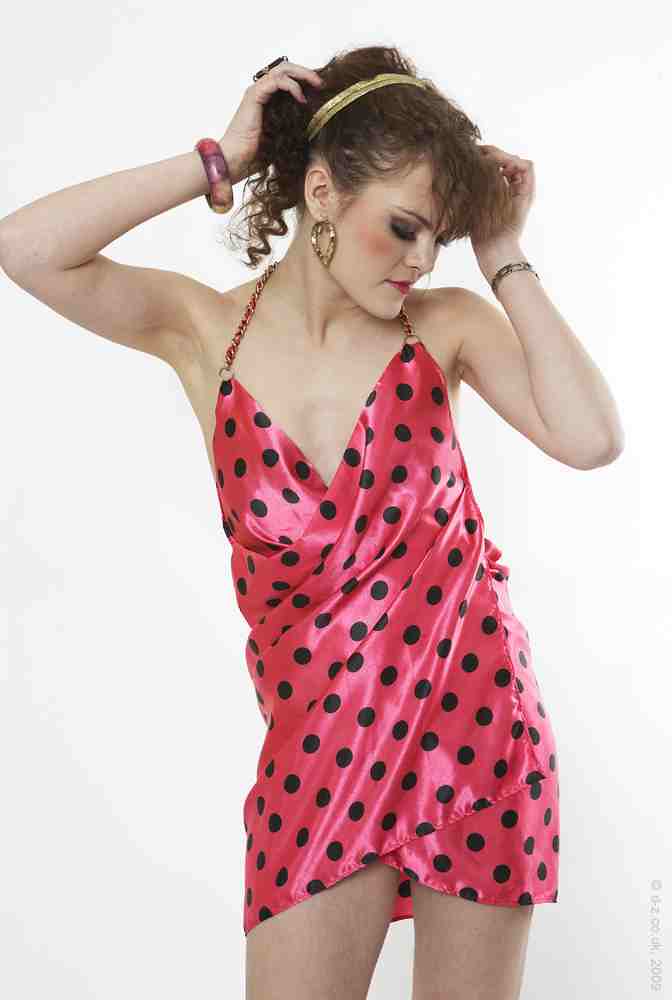 black dress with pink polka dots
