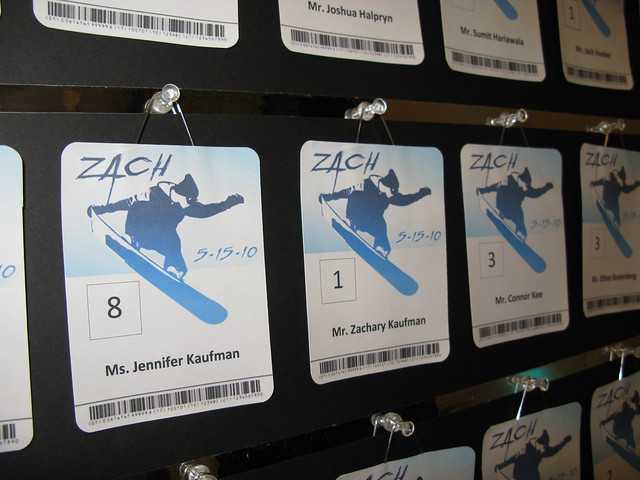 Custom snow boarding ski pass themed place cards for a Bar Mitzvah at the Westin in Waltham