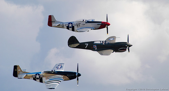 P40 and P51 Mustangs in formation 22