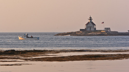 EOS20D_2010_MG_4603 by Barb and Dean, Catch 22 checks lobster traps off Cuckolds Light, Newagen Harbor, Maine, at sunrise.ocean lighthouse