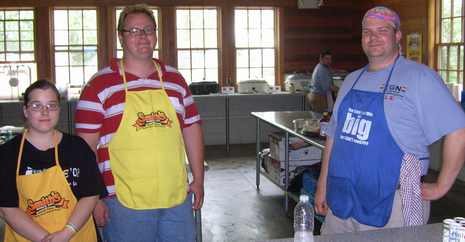 Tracy, Carl &amp; Jeremy (Gary in background) kitchen staff/volunteers. Photo by James von Loewe