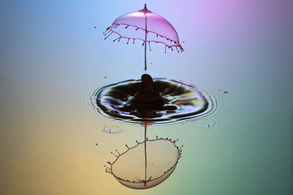 Umbrella Splash by *Corrie*
