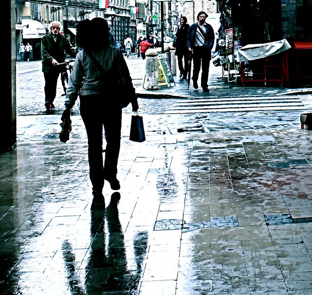 parma woman walking rain