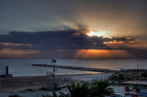 ocean barcelona sea sky sun beach water clouds sunrise skyscape spain mediterranean playa catalonia sunburst catalunya rays hdr tarragona platja lapineda balearic photomatix tonemapped tonemapping