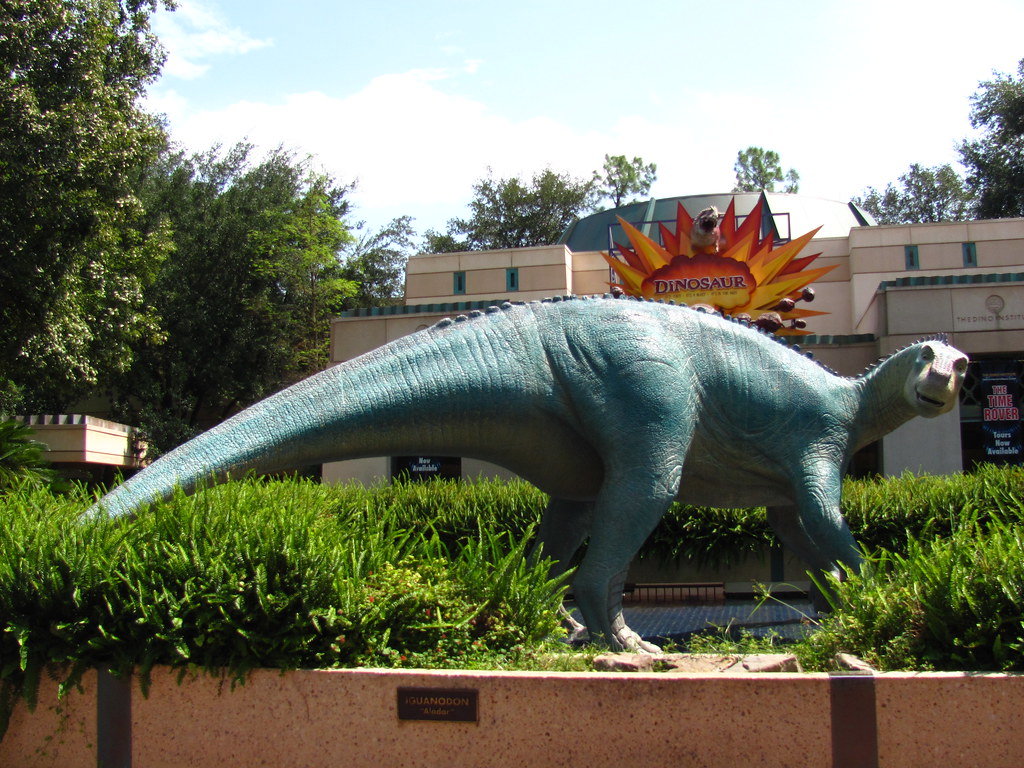 Statue of Aladar the Iguanodon in front of the Dinosaur Ride at Dinoland USA