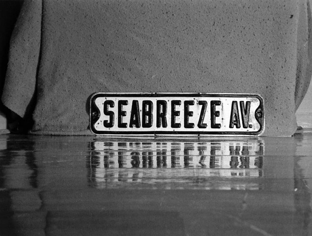 My friends and I pilfered (uh...temporarily borrowed) this Seabreeze Avenue sign, then photographed our new prize in a secret, undisclosed location.  Milford Connecticut. Aug 1973