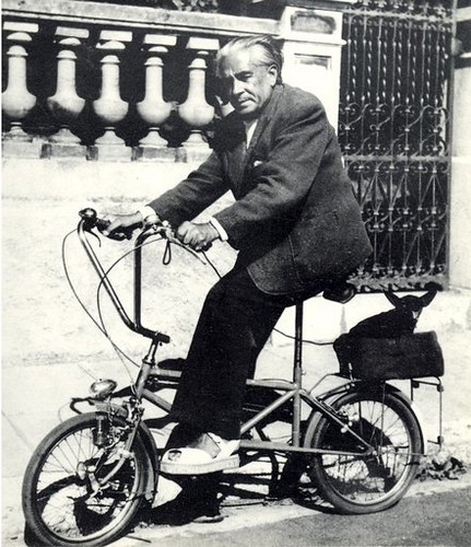 Picabia, Francis (1879-1953) on his bicycle with his dog Ninie in September 1940 during a petrol shortage, photographed by his wife Olga.