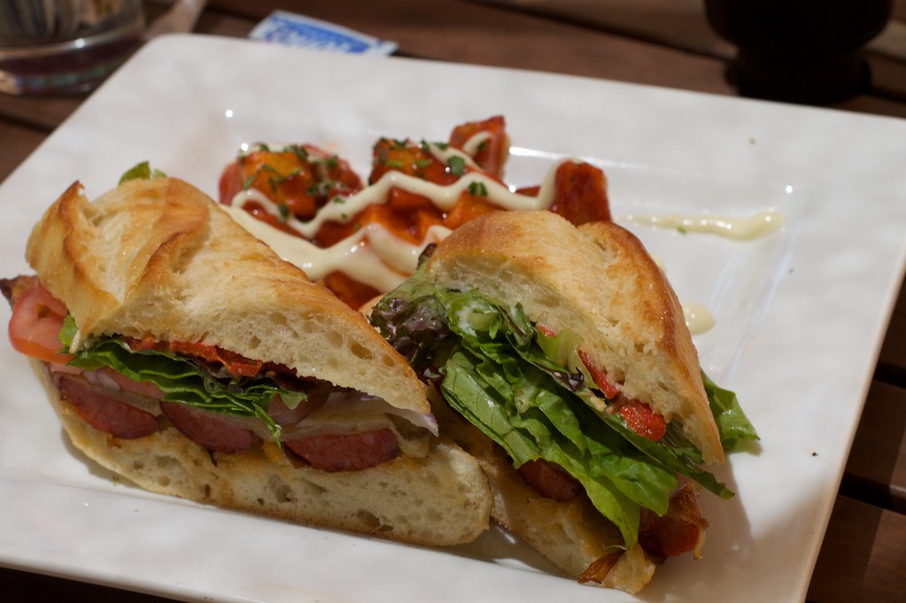 Freshly prepared chicken sandwich with lettuce and tomato