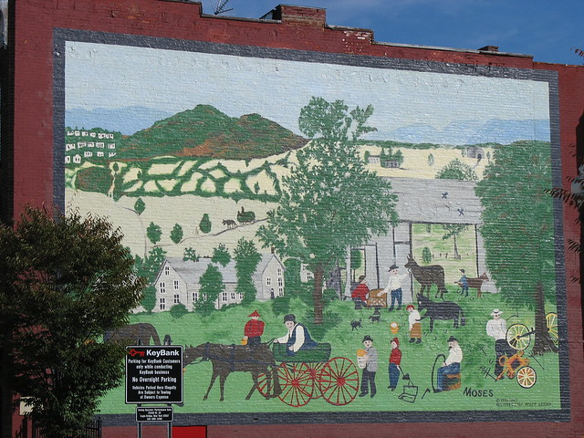 Wall mural depicting a Grandma Moses painting