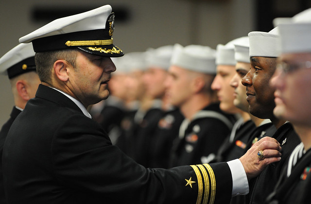 Commander and Sailors at Awards Ceremony