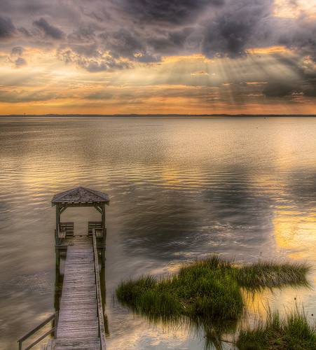 sunset water clouds pier nc cloudy northcarolina stormy sunrays outerbanks seagrass obx waterreflections curritucksound