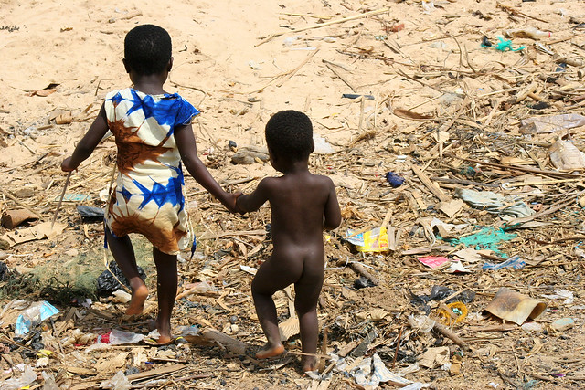 Holding hands in the slums of Accra, Ghana.