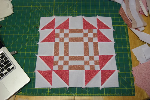 This 15' Goose in the Pond block sent me scurrying back to call reproductionfabrics.com to get her to ship me additional fabrics. I dissected this block into two parts -- the cinnamony interior and the bright pink exterior.  The bright pink exterior got a sunnier pink to match it, and went on to become the quilt Lucy-Goosey. The cinnamony interiors got paired with a dusty lilac that brought out the best in the color, and will go on to be a quilt called Linus.

Seriously, if you're going to nickname a quilt Lucy, and spin off fabrics from it, what ELSE would you call it?