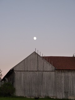 Moon over barn