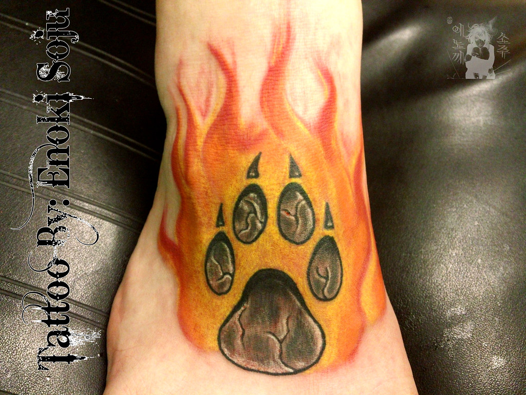 Custom Wolf Paw with Flames Tattoo