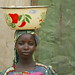 Jun/2005 - A young girl sells food to villagers outside Kano, Nigeria (photo credit: ILRI/Stevie Mann).