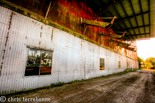 old sunset rural louisiana colorful decay farm manufacturing