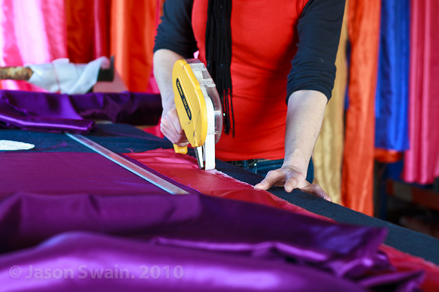 Artisan. Woman working with colourful fabrics #3