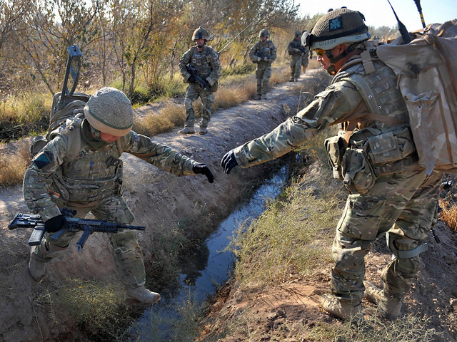 British Army | Ranger Michael Wilters, 2 R IRISH, helps the … | Flickr