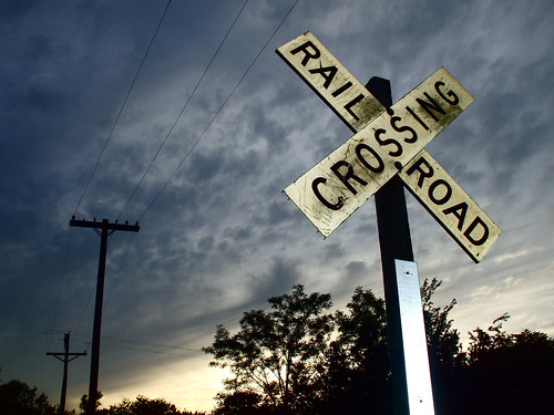 railroad sunset lines sign electric clouds rural wire crossing milo telephone pole mo missouri