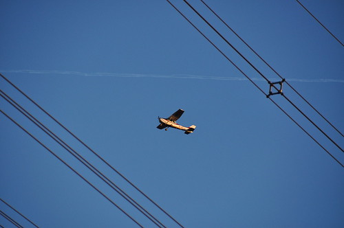 Airplane Frame | A small plane seen through power lines. | kpmarek | Flickr