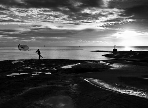 ocean sea net sunrise fishing fisherman rocks kourou frenchguiana guiana hoteldesroches