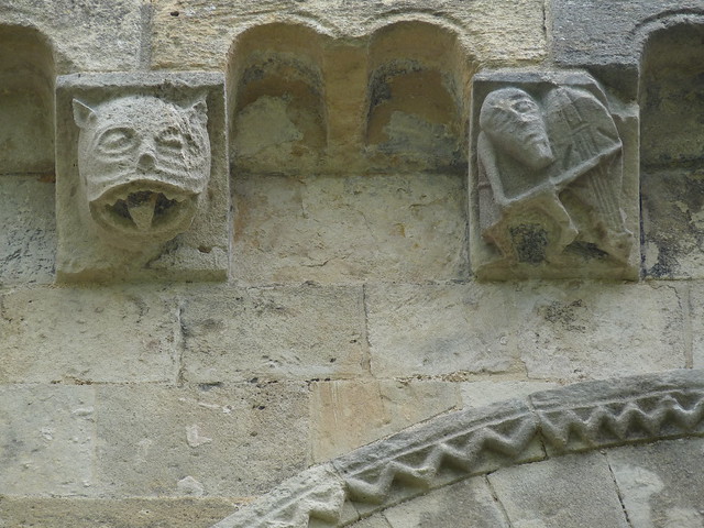 Romsey Abbey corbels: cat and violinist
