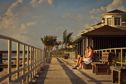 morning people beach clouds sunrise bench couple sitting florida shore boardwalk verobeach
