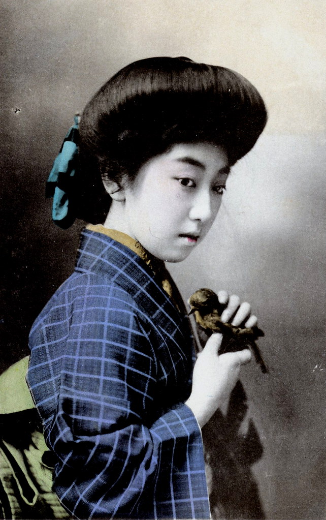 Geisha Teruha holding a Bird 1910s