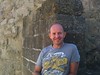 Gary Bembridge on the ramparts at Carcassonne France by Tips For Travellers