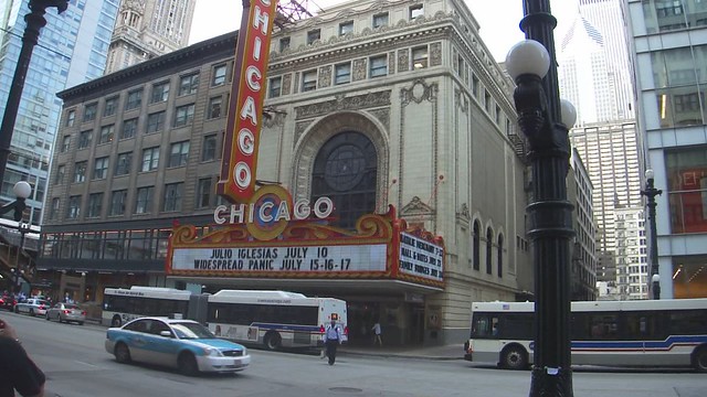 VIDEO: Bouncy balls on lightpole across the street from the Chicago Theater